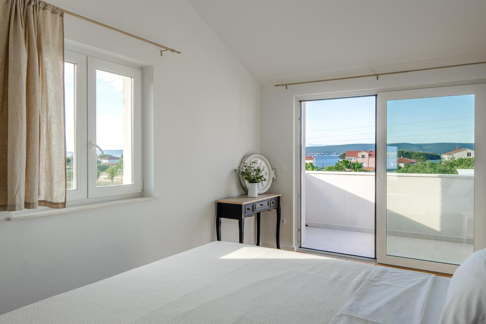 Spavaća soba s izlazom na balkon